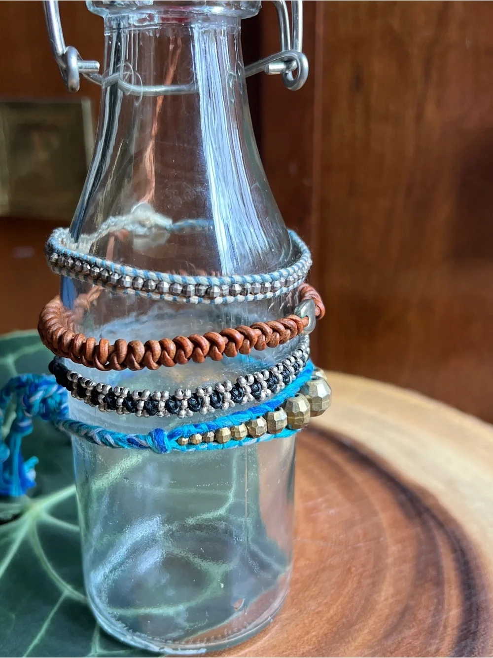 Set of Four. Stackable Beaded and Cord Bracelets - Blue, Brown, Silver, Gold
